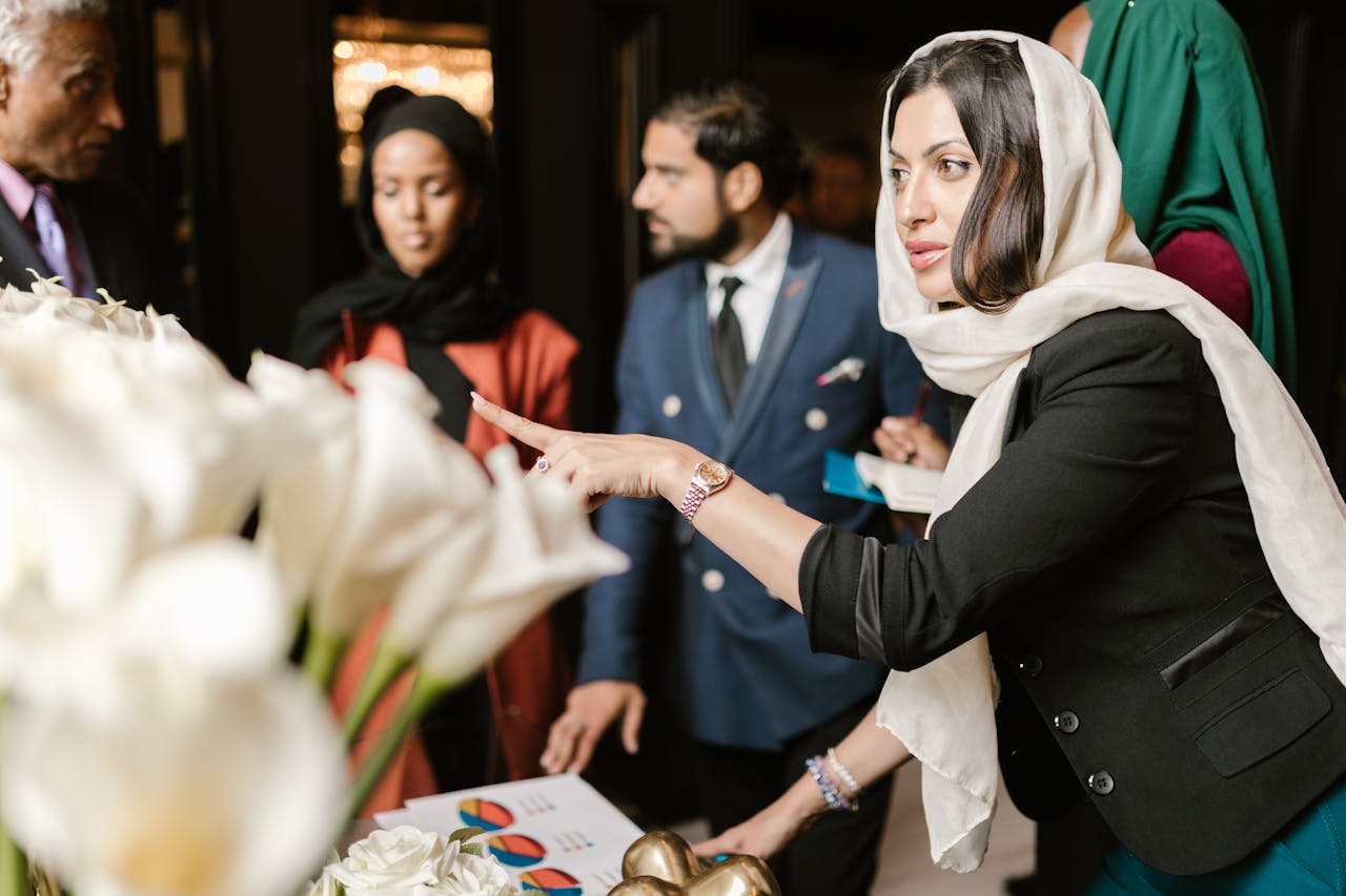 Woman in White Hijab Pointing her Finger